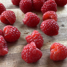 Load image into Gallery viewer, fresh raspberries on a wooden board

