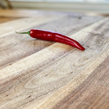 Load image into Gallery viewer, fresh red chilli on a wooden board
