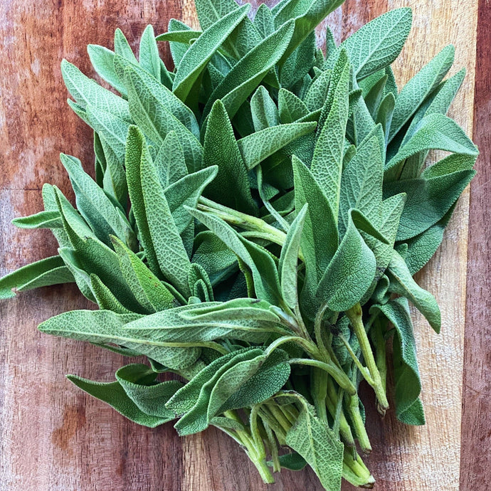 fresh sage on a wooden board