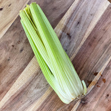 Load image into Gallery viewer, fresh celery on a wooden board
