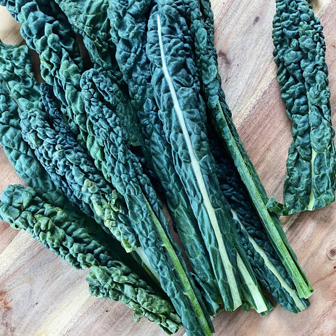 cavolo nero on a wooden board