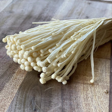 Load image into Gallery viewer, enoki mushrooms on a wooden board
