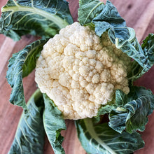 Load image into Gallery viewer, raw cauliflower on a board

