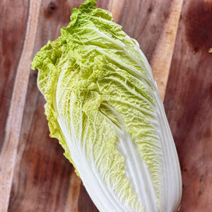 chinese leaf lettuce on a wooden  board