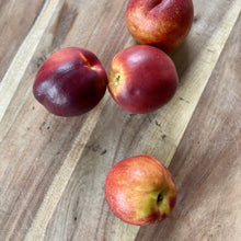 Load image into Gallery viewer, 4 nectarines on a wooden board
