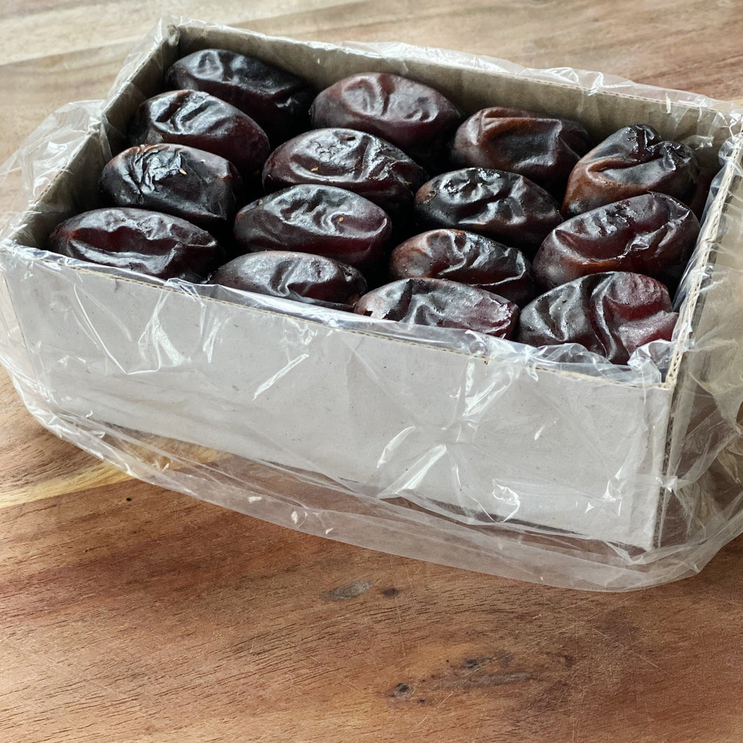 persian dates in a plastic lined box