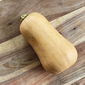 butternut squash on a wooden board