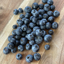 Load image into Gallery viewer, blueberries on a wooden board
