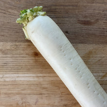 Load image into Gallery viewer, white radish mooli on a wooden board
