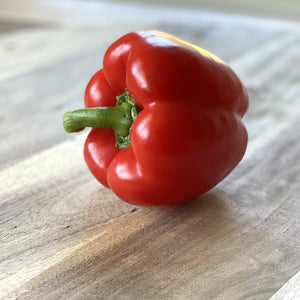 red pepper on a wooden board