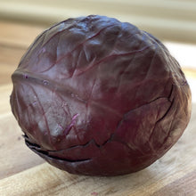Load image into Gallery viewer, purple red cabbage on a wooden board
