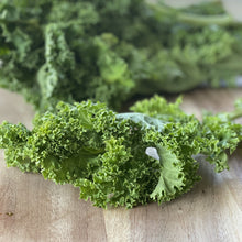 Load image into Gallery viewer, fresh kale on a wooden board
